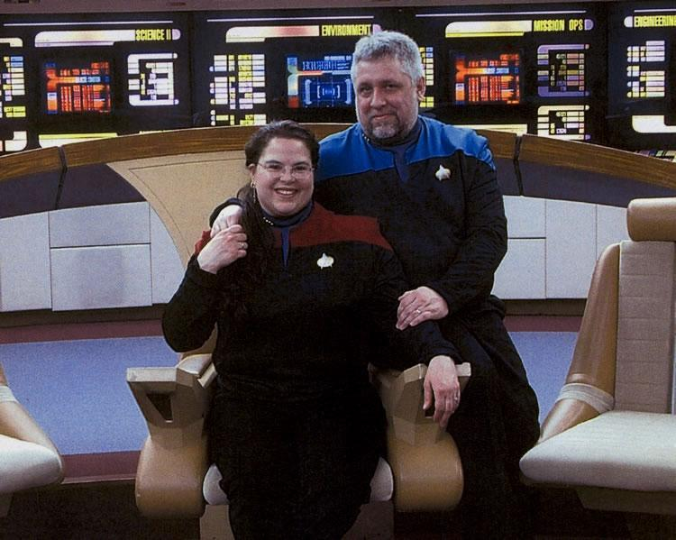 Cathy and Jeff on the bridge of the Starship Enterprise 1701D. Cathy outranks Jeff, as it should be.